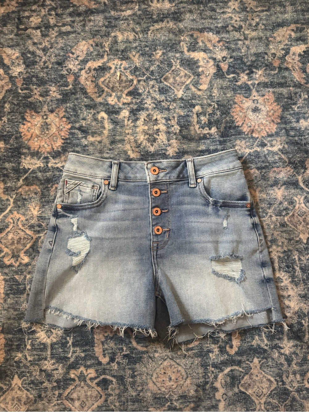 High-Rise Light Blue Distressed Button-Front Denim Shorts